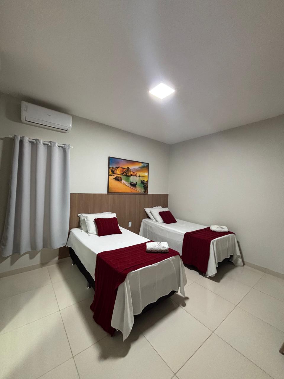 Quarto duplo com duas camas